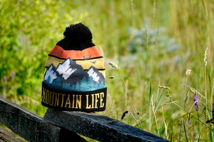 Mountain Life Knit Beanie with Pom Pom Winter Hat Sunset Hiking Ski Snow Gear