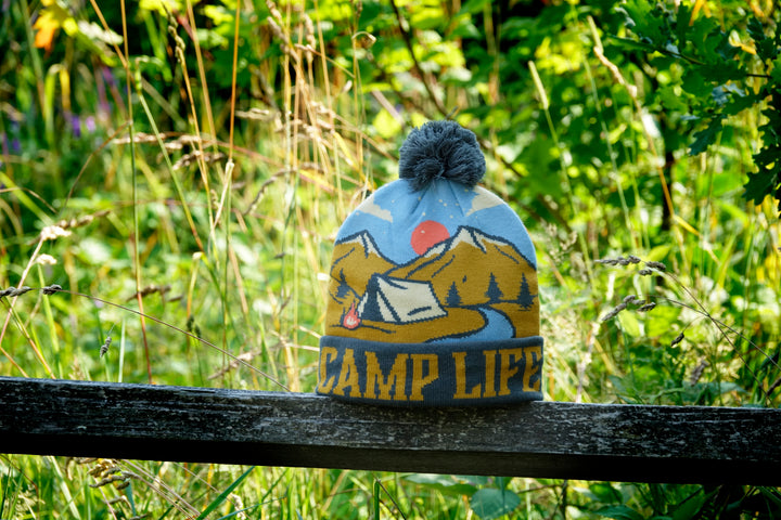 Camp Life Beanie with Mountains, Tent and Campfire Design Pom Pom Winter Hat