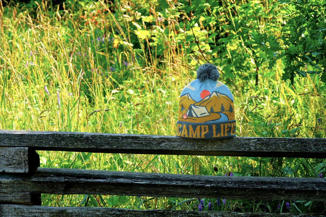 Camp Life Beanie with Mountains, Tent and Campfire Design Pom Pom Winter Hat