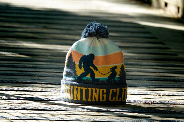 Hunting Club Bigfoot Dog Knit Beanie with Pom Pom Winter Hat Outdoor Camp Gear