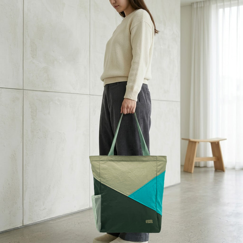 A lightweight tote designed for everyday use, blending outdoor inspiration with clean, modern functionality.