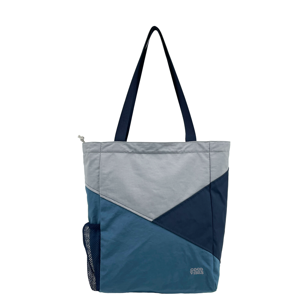 A lightweight tote designed for everyday use, blending outdoor inspiration with clean, modern functionality.